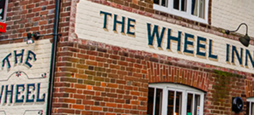 Wheel inn banner acm254