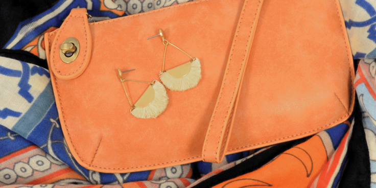 Lux Crossbody Wristlet Clutch in cantaloupe from Live in the Light
